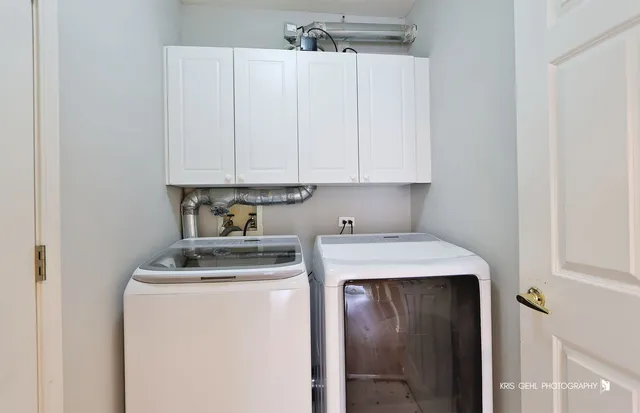 a view of a balcony with couches and wooden floor
