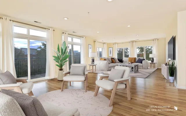 a view of an entryway with wooden floor