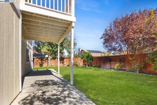 a view of a backyard with a garden