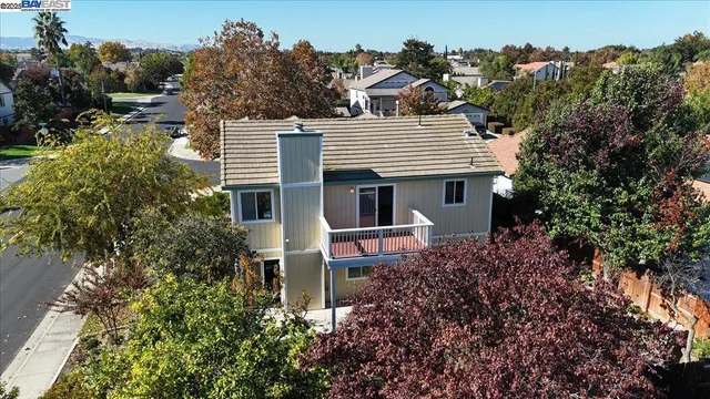 an outdoor view of house with green space