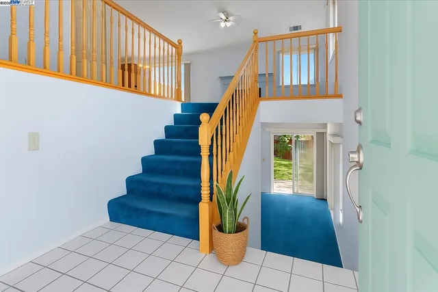 a view of entryway with a front door