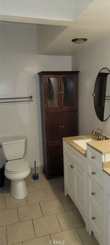 a bathroom with a toilet and a sink