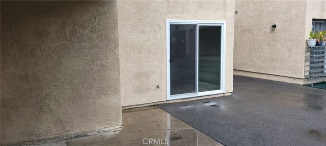 wooden floor and window in an empty room
