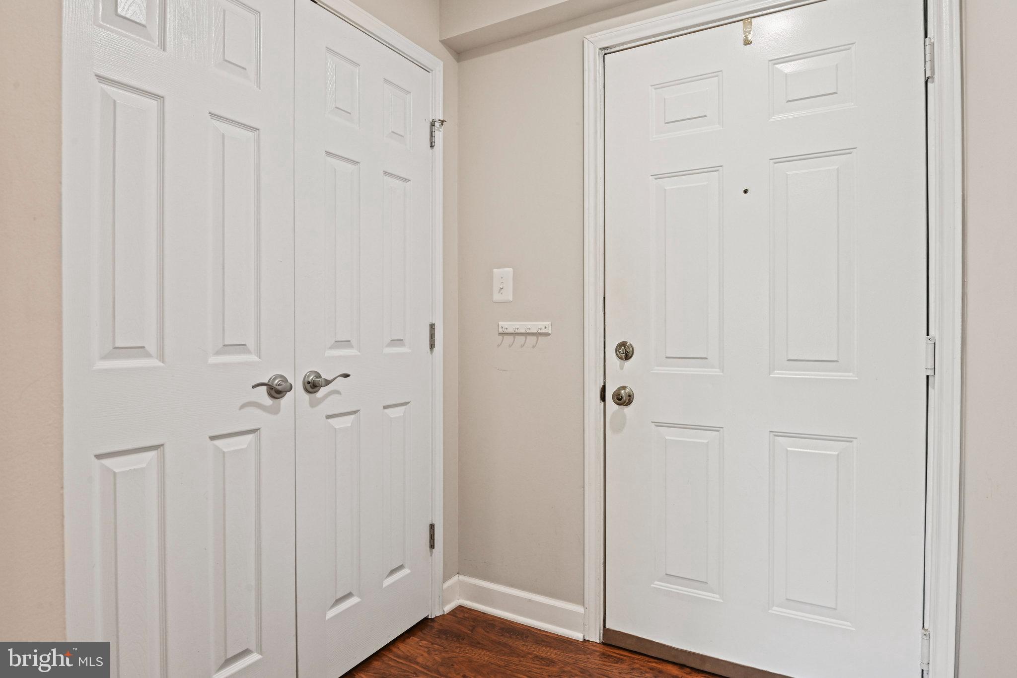 21013 Timber Ridge Terrace, Unit 202 Ashburn, VA 20147 - Photo 3 of 42 a view of an entryway with livingroom