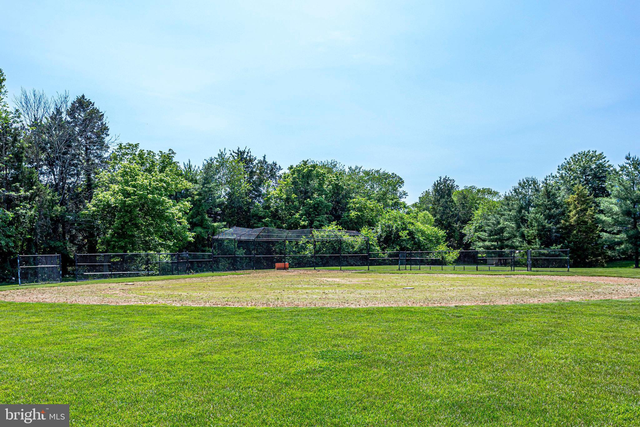 21013 Timber Ridge Terrace, Unit 202 Ashburn, VA 20147 - Photo 32 of 42 a view of a tennis court