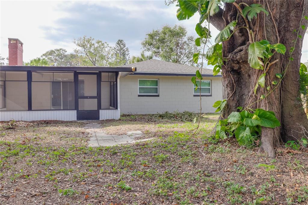 110 Duval Road Winter Haven, FL 33884 - Photo 25 of 25 a house with trees in the background