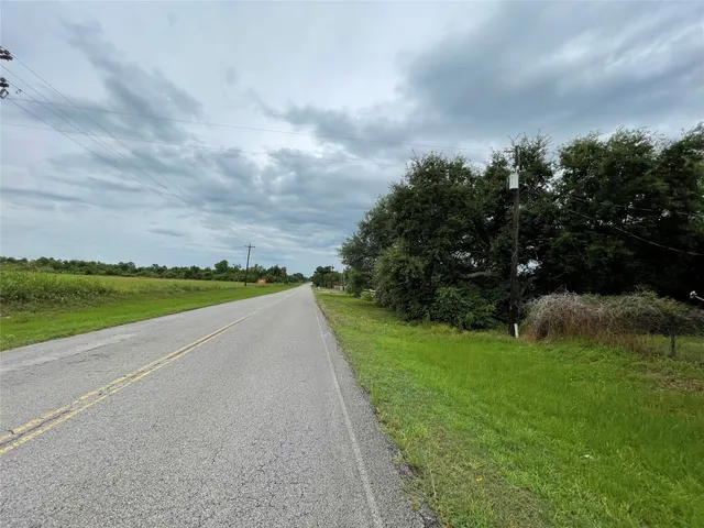a view of a lake with a big yard