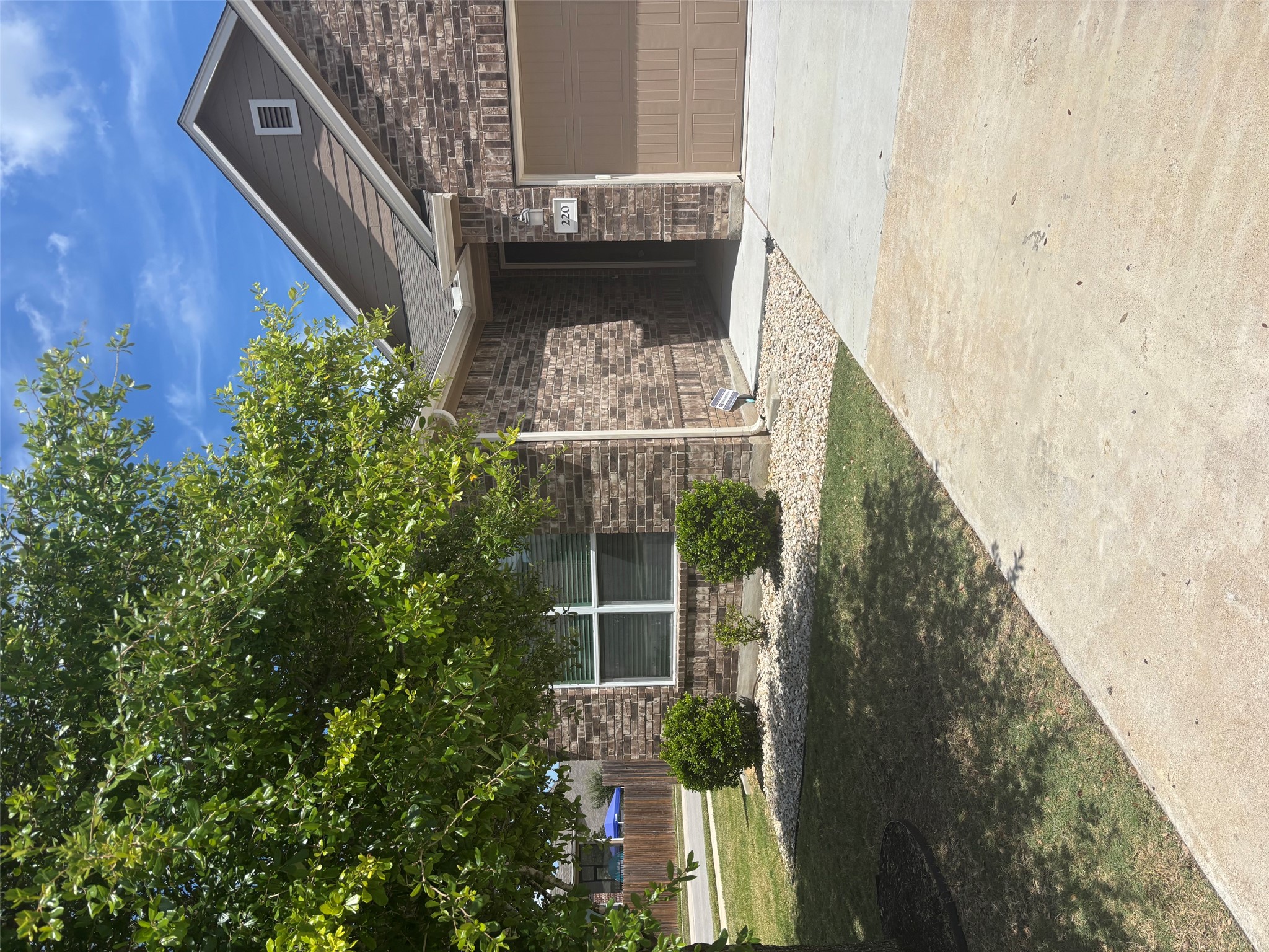 220 Rocroi Drive Georgetown, TX 78626 - Photo 1 of 1 A classic brick exterior offers enduring appeal with a well-maintained yard and concrete driveway.