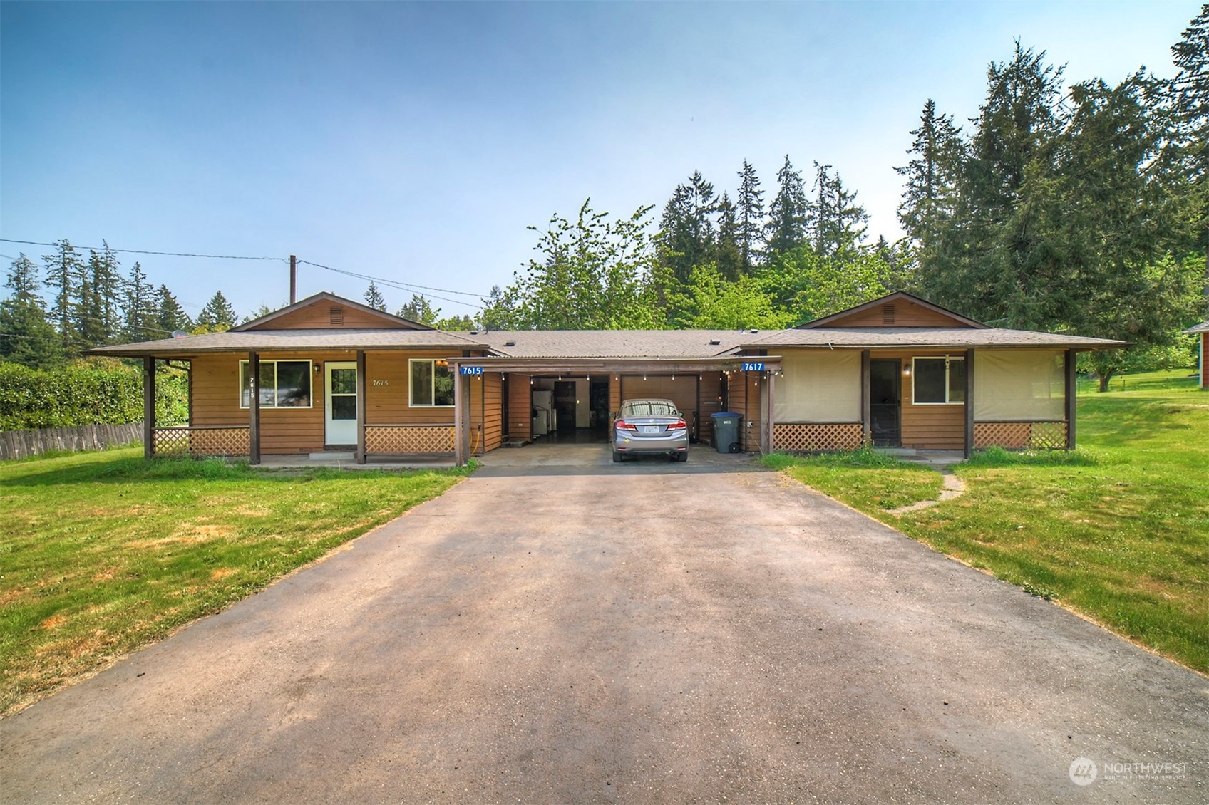 front view of a house with a yard