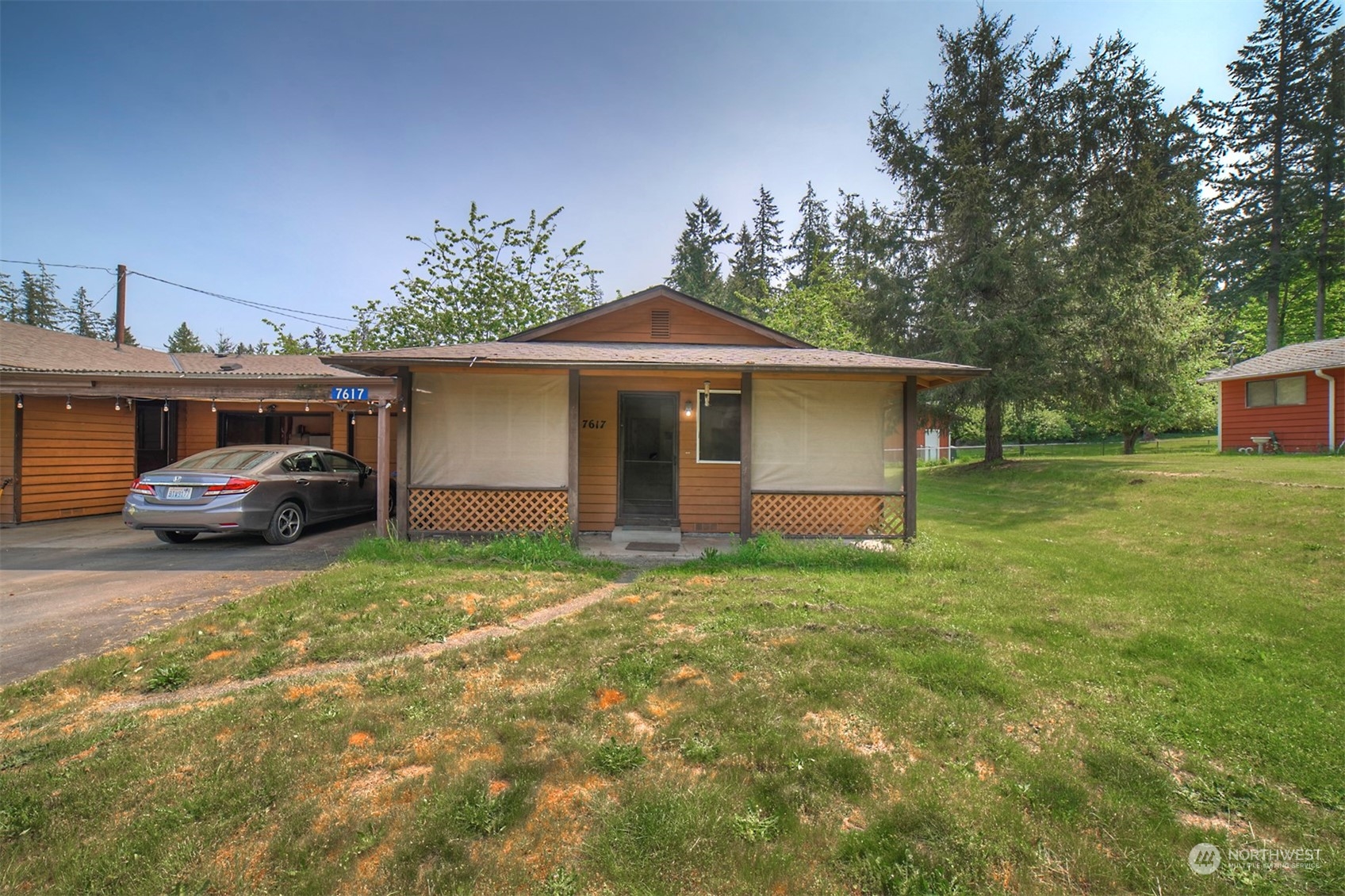 7615 Illahee Road Northeast Bremerton, WA 98311 - Photo 15 of 23 a front view of a house with garden
