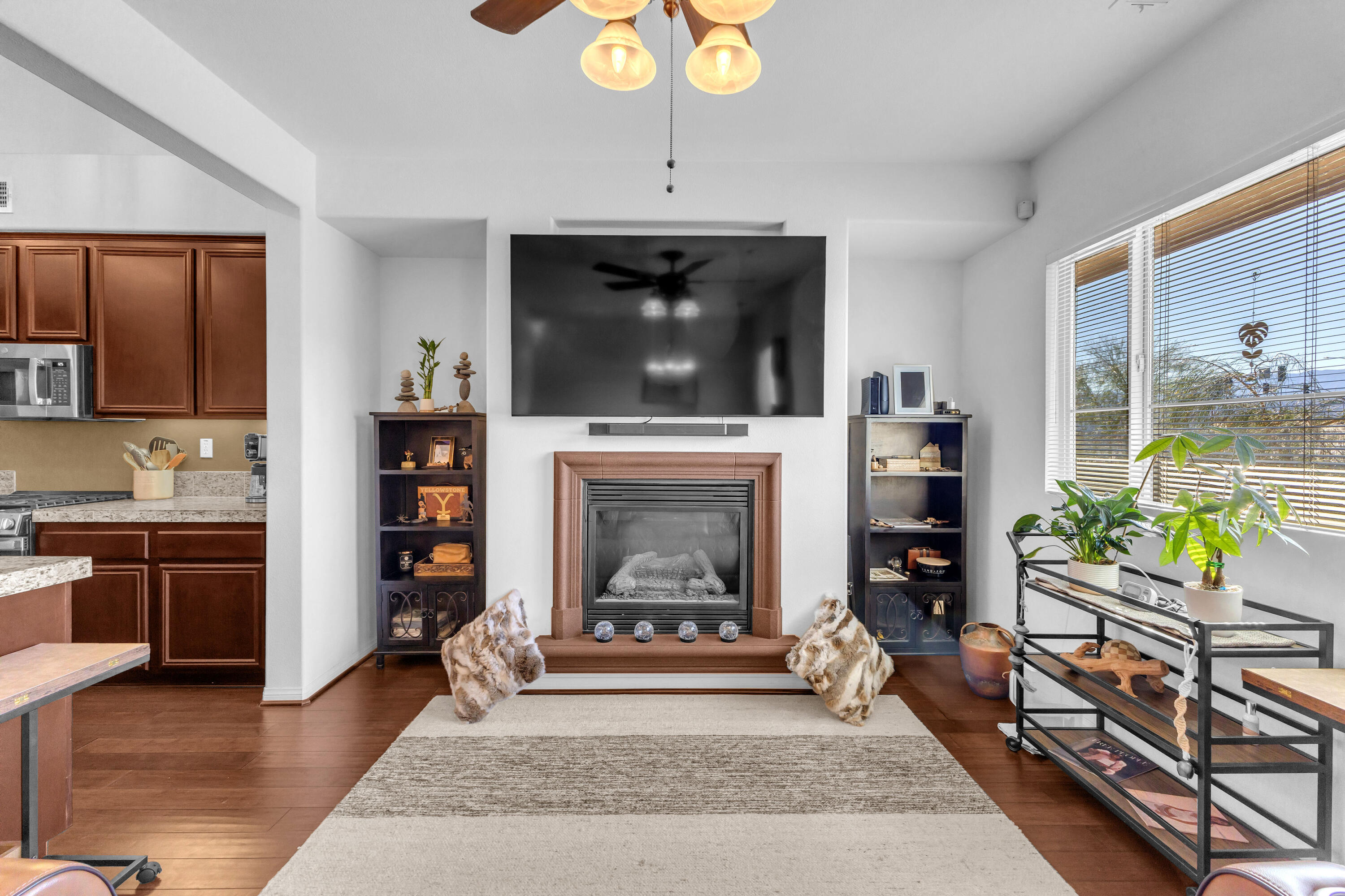 73268 Azure Rain, Unit 102 Palm Desert, CA 92211 - Photo 21 of 44 a living room with furniture and a fireplace