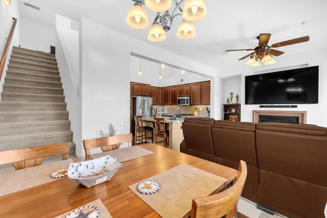 a bedroom with a bed and a television