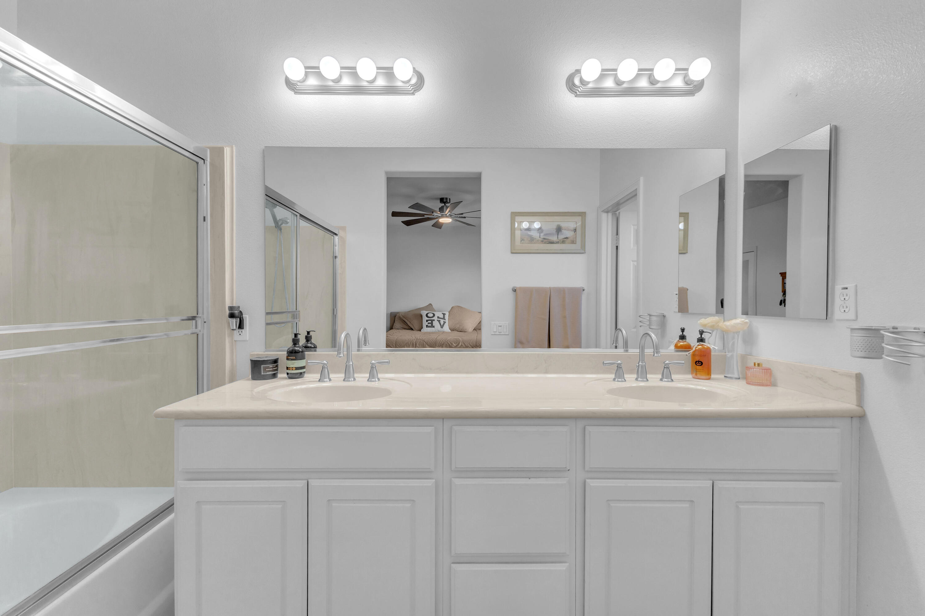 73268 Azure Rain, Unit 102 Palm Desert, CA 92211 - Photo 30 of 44 a bathroom with a sink and a mirror