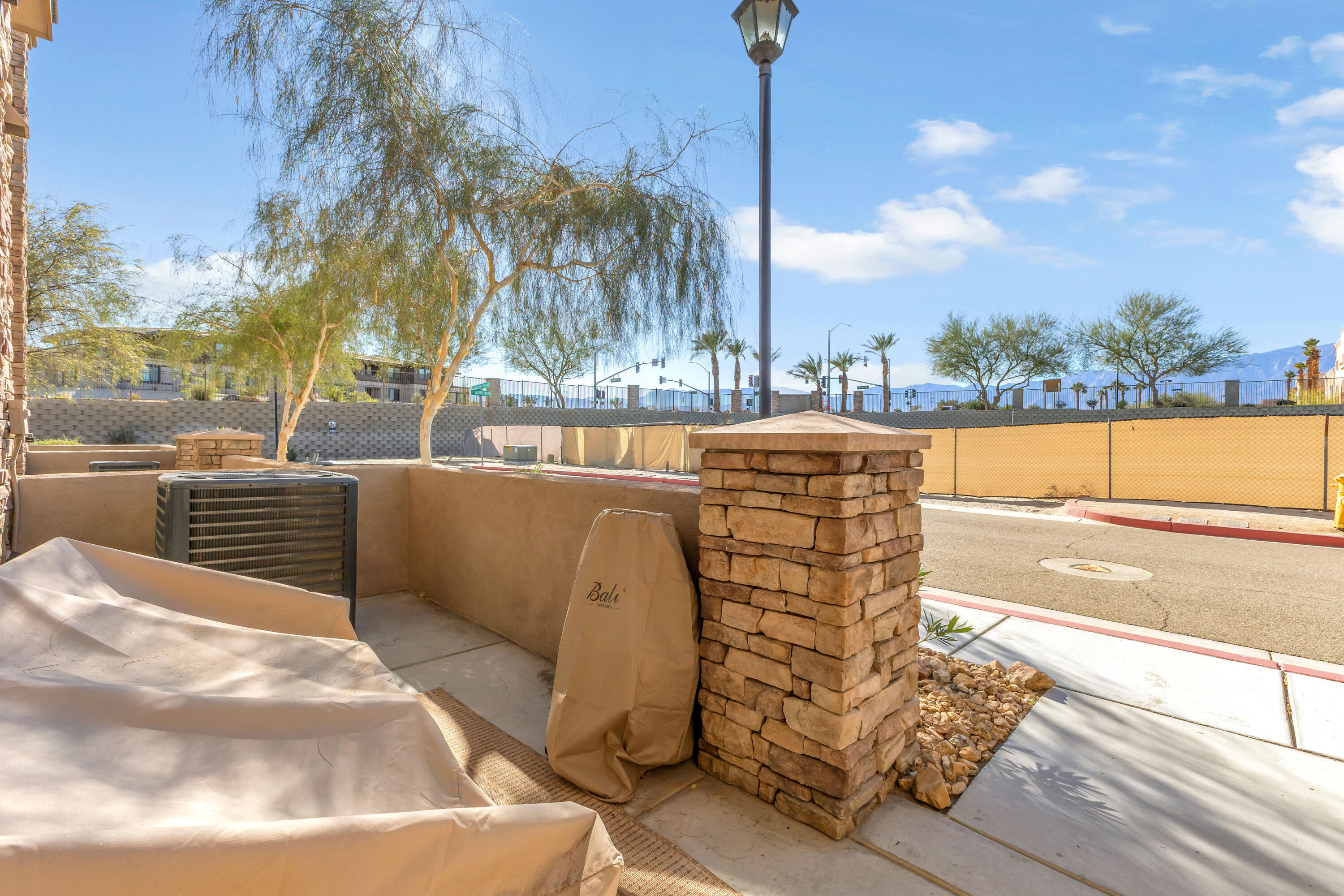 73268 Azure Rain, Unit 102 Palm Desert, CA 92211 - Photo 3 of 44 a view of swimming pool with outdoor seating and plants
