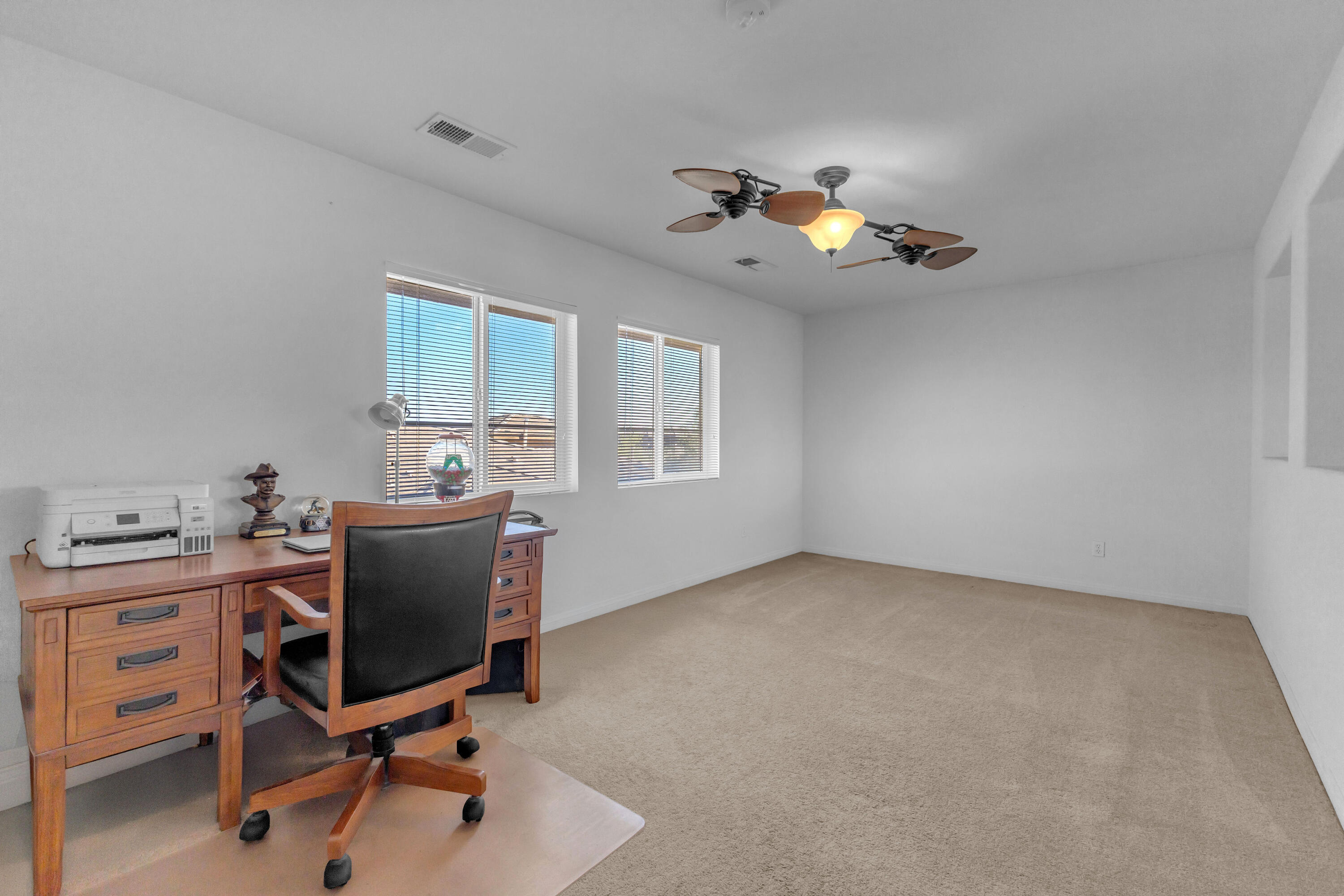 73268 Azure Rain, Unit 102 Palm Desert, CA 92211 - Photo 34 of 44 a view of workspace with windows