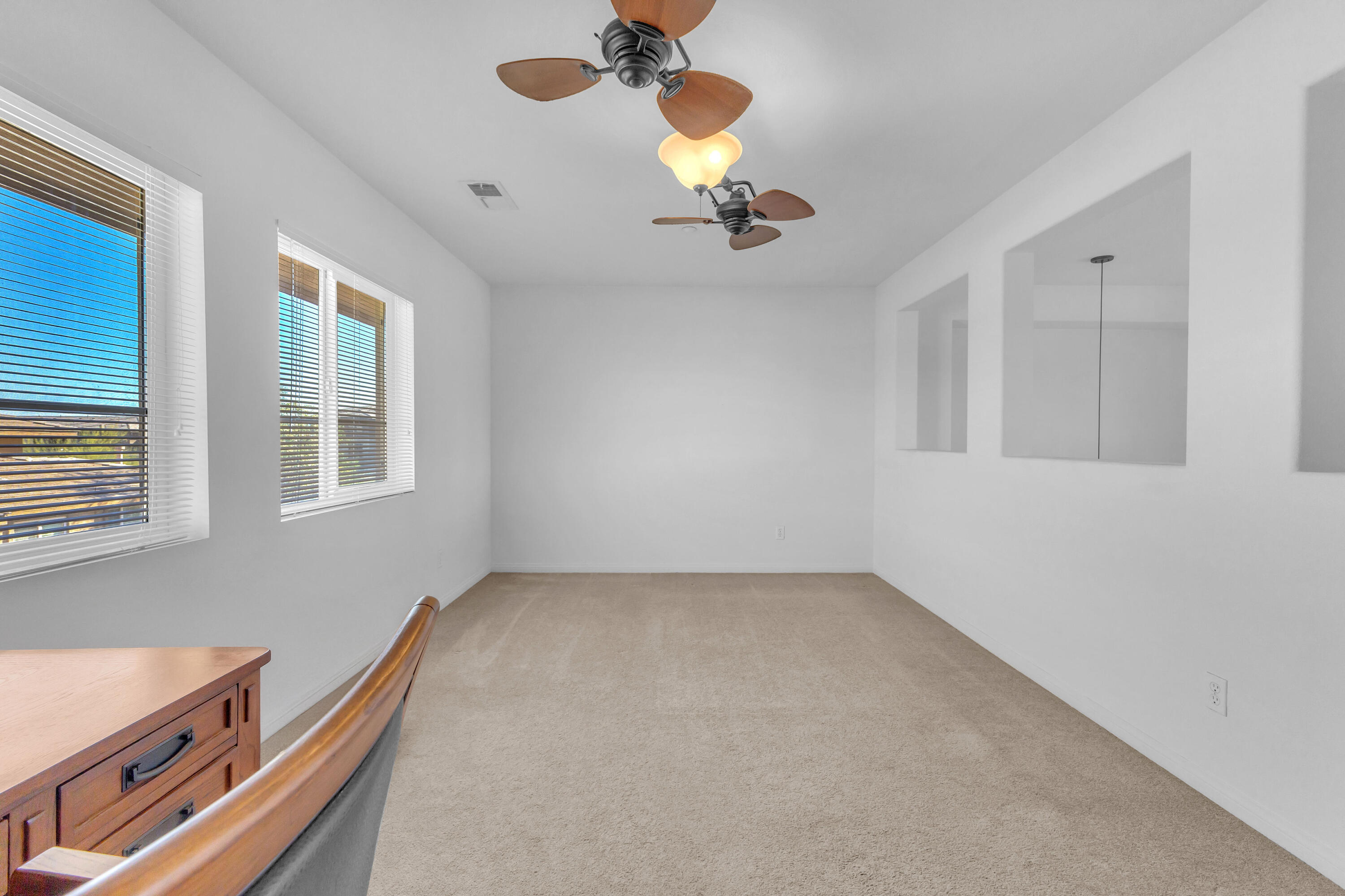 73268 Azure Rain, Unit 102 Palm Desert, CA 92211 - Photo 35 of 44 a view of an empty room with a window