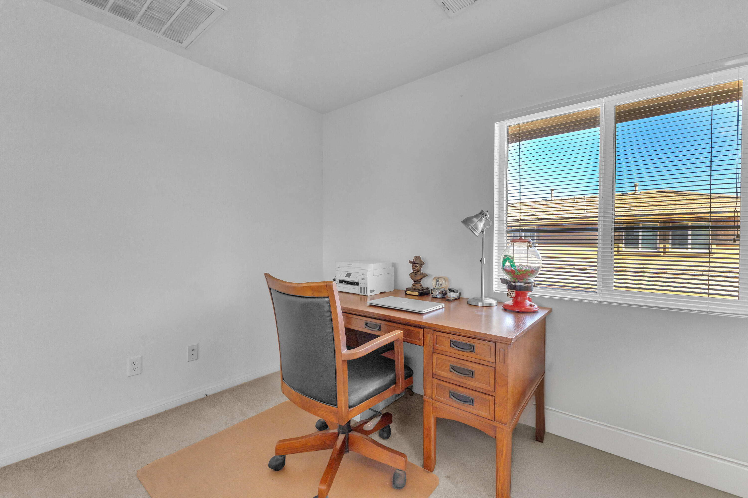 73268 Azure Rain, Unit 102 Palm Desert, CA 92211 - Photo 37 of 44 a workspace with furniture and a window