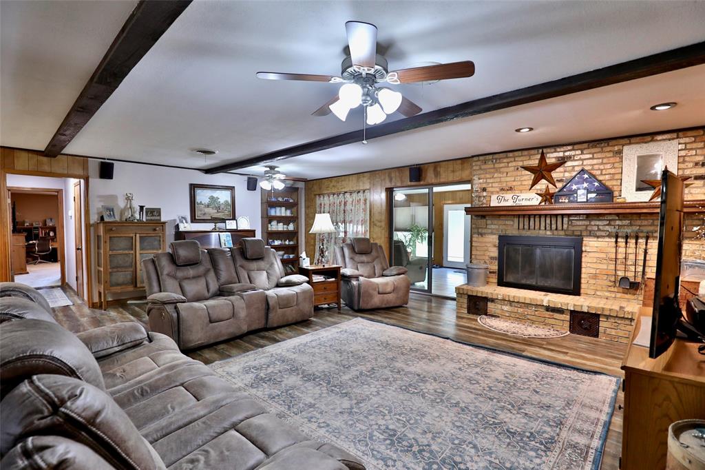 448 Elmdale Road South Abilene, TX 79602 - Photo 5 of 39 a living room with furniture and a flat screen tv