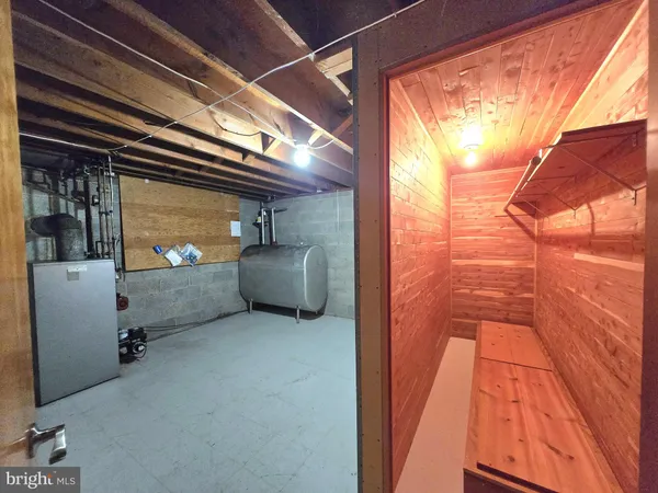 a view of a room with wooden walls