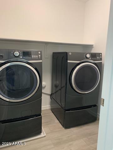 17850 North 68th Street, Unit 2063 Phoenix, AZ 85054 - Photo 9 of 23 a utility room with dryer and washer