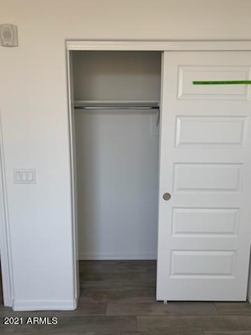 17850 North 68th Street, Unit 2063 Phoenix, AZ 85054 - Photo 10 of 23 a view of walk in closet with empty racks