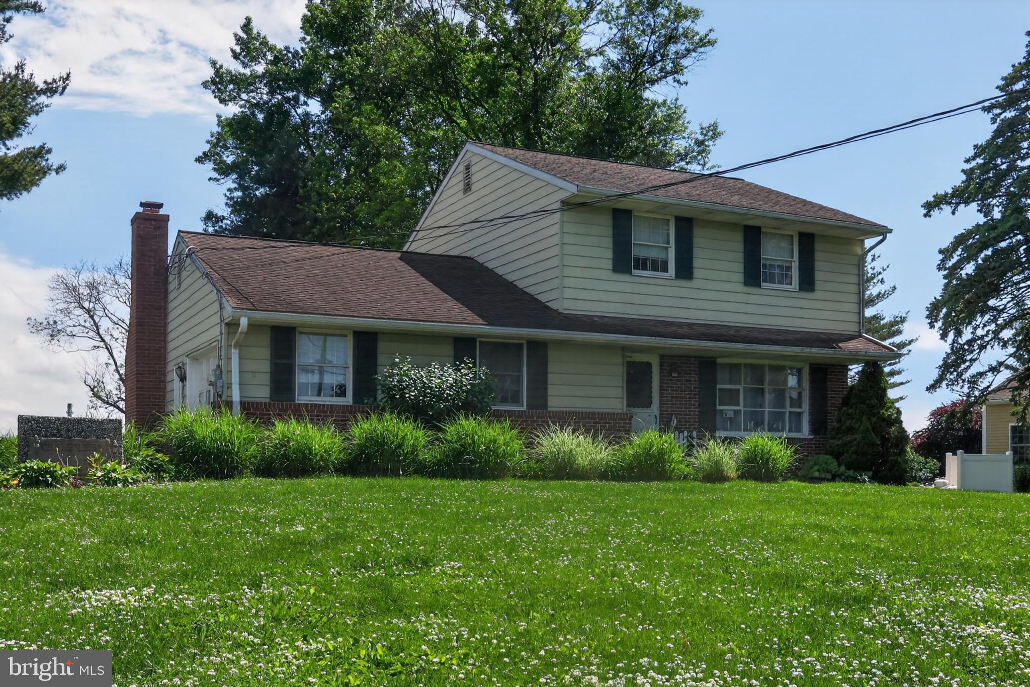 1106 Village Road Lancaster, PA 17602 - Photo 16 of 42 Charming home with lush greenery.