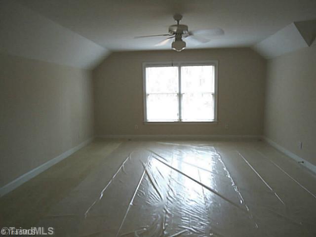 1807 Wild Fern Drive Oak Ridge, NC 27310 - Photo 13 of 16 Bonus. Bonus Room for the children with plenty of walk-in storage space AND BRAND NEW CARPET