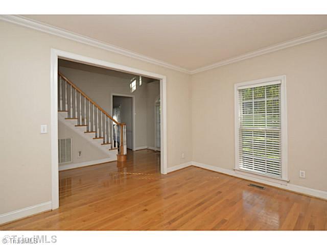 1807 Wild Fern Drive Oak Ridge, NC 27310 - Photo 4 of 16 Living Room. Nice front room that can be used as a living room or add French doors and create a private office space