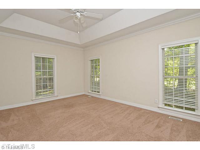 1807 Wild Fern Drive Oak Ridge, NC 27310 - Photo 9 of 16 Master Bedroom. Large Master Bedroom on the main level with tray ceiling