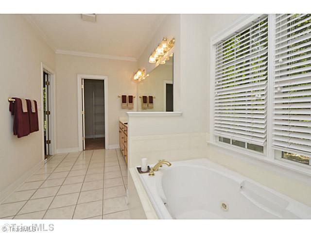 1807 Wild Fern Drive Oak Ridge, NC 27310 - Photo 10 of 16 Master Bath/Spa. Master Bath with jetted tub and separate shower and double vanity