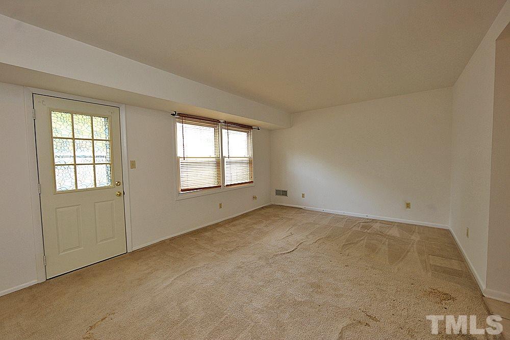 5141 Revere Road, Unit 29 Durham, NC 27713 - Photo 3 of 13 an empty room with windows