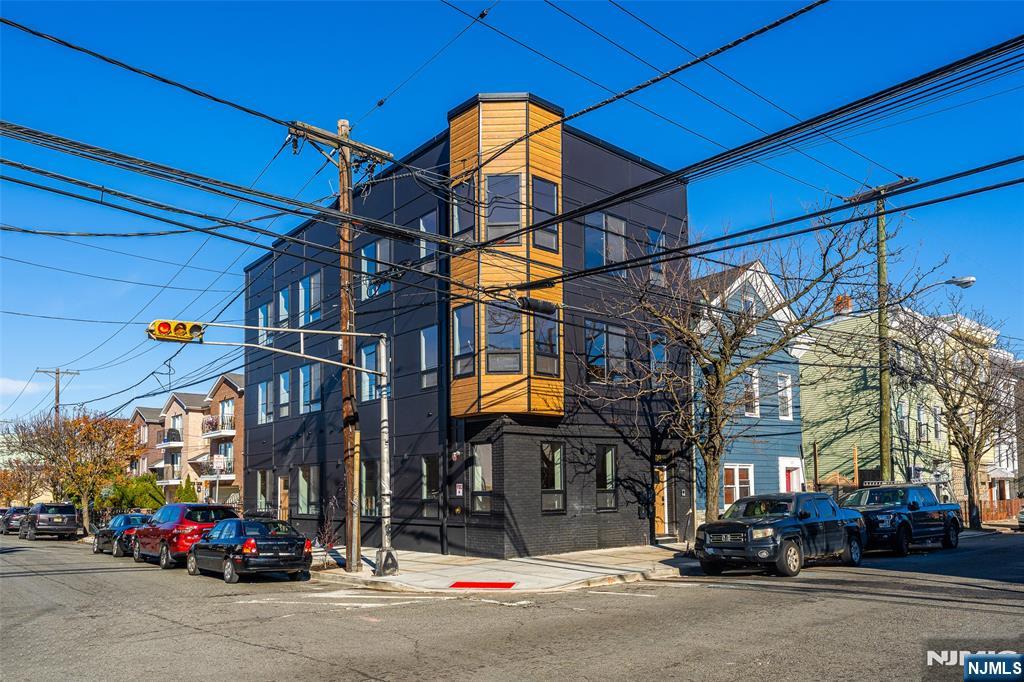 108 Fleming Avenue, Unit 2B Newark, NJ 07105 - Photo 19 of 21 a car parked in front of a building