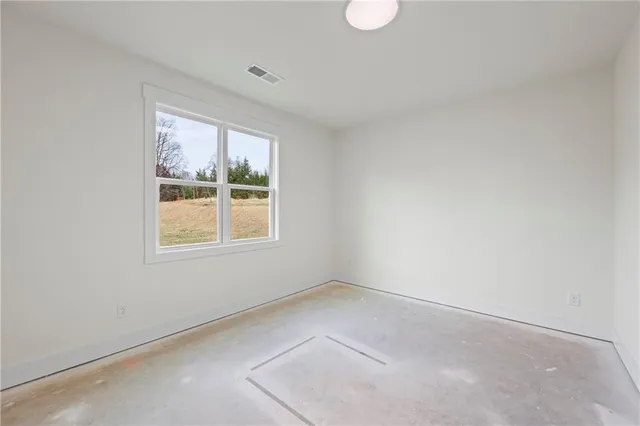 an empty room with windows