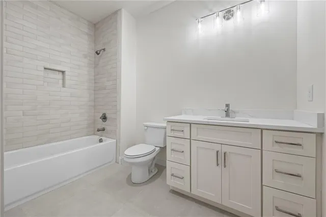 a view of a room with a empty space and window