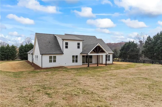 a view of outdoor space with signage and flags