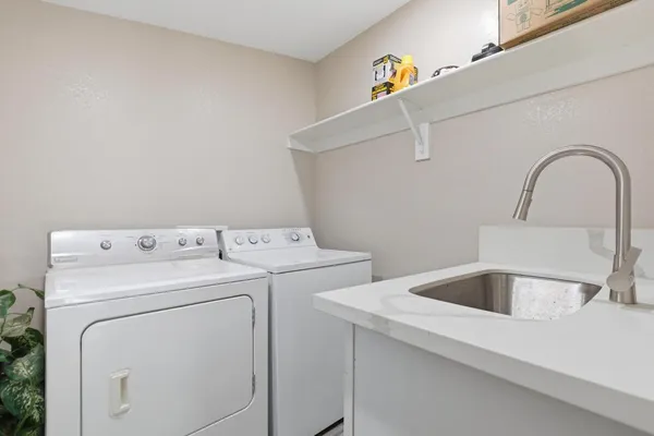 a utility room with dryer and washer