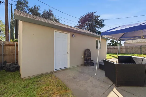 a house view with a backyard space