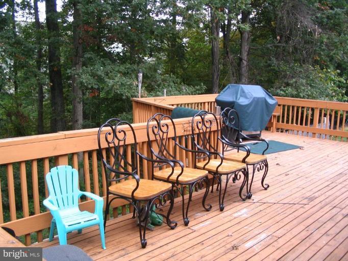 13456 Keytone Road Woodbridge, VA 22193 - Photo 3 of 3 a view of a chairs and table on the wooden floor