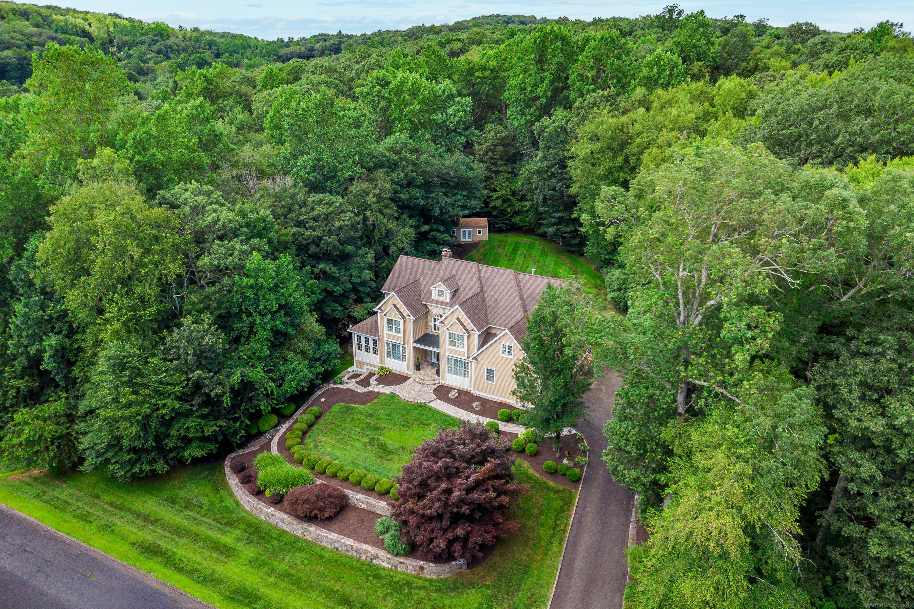 8 Buck Trail Newtown, CT 06482 - Photo 1 of 1 a view of a garden with a house
