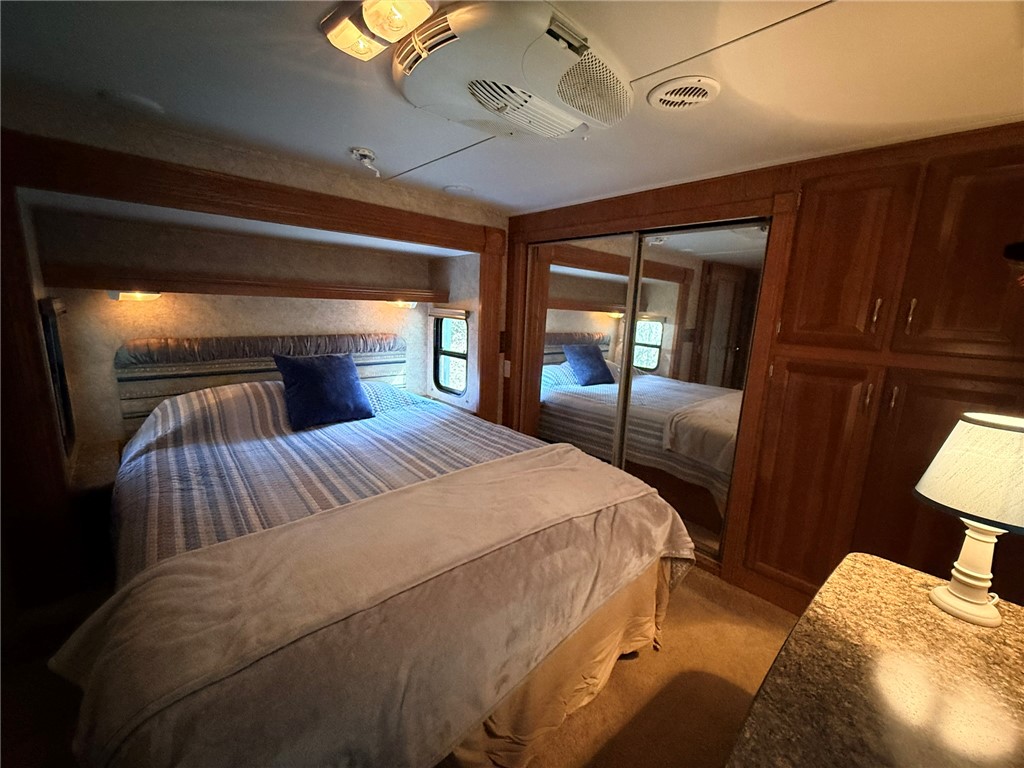 208 Reston Way Westminster, SC 29693 - Photo 15 of 32 This cozy sleeping area features convenient built-in storage and bright overhead lighting.