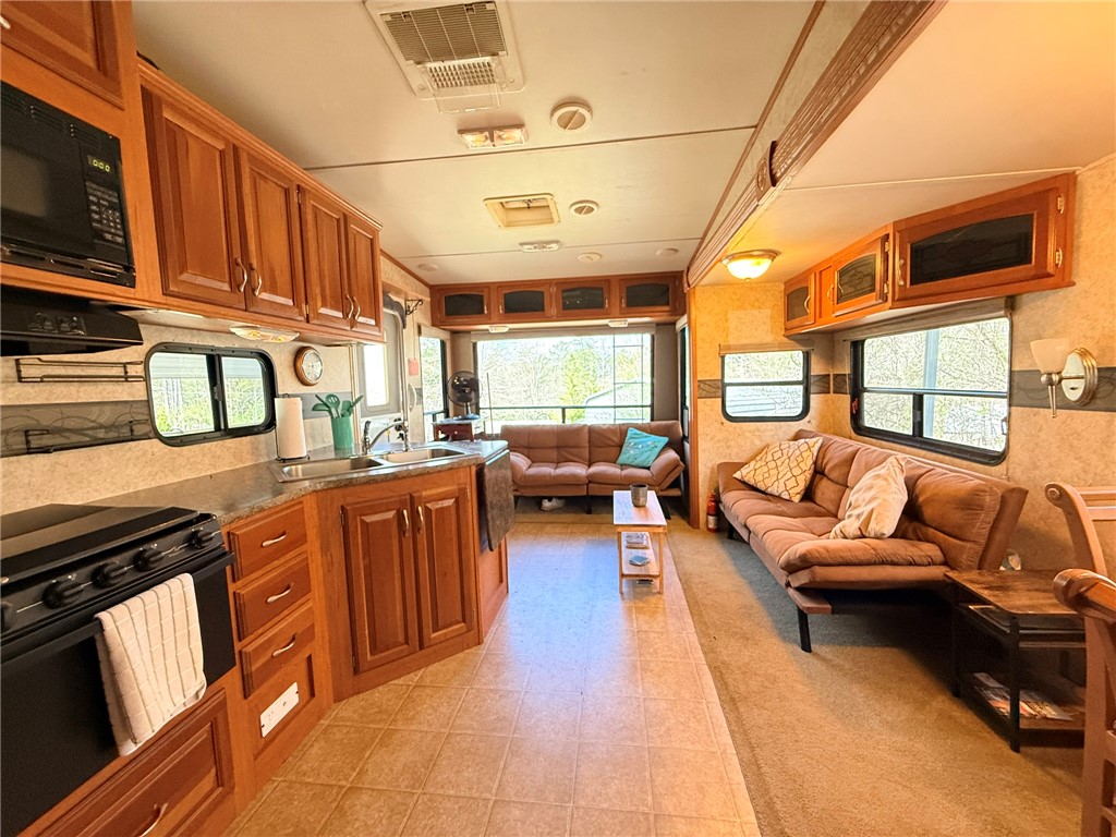 208 Reston Way Westminster, SC 29693 - Photo 3 of 32 This cozy interior offers efficient living with thoughtful design.