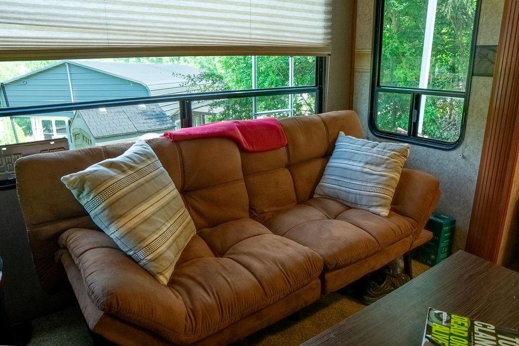 208 Reston Way Westminster, SC 29693 - Photo 6 of 32 This cozy living area offers ample natural light and a pleasant outdoor view.