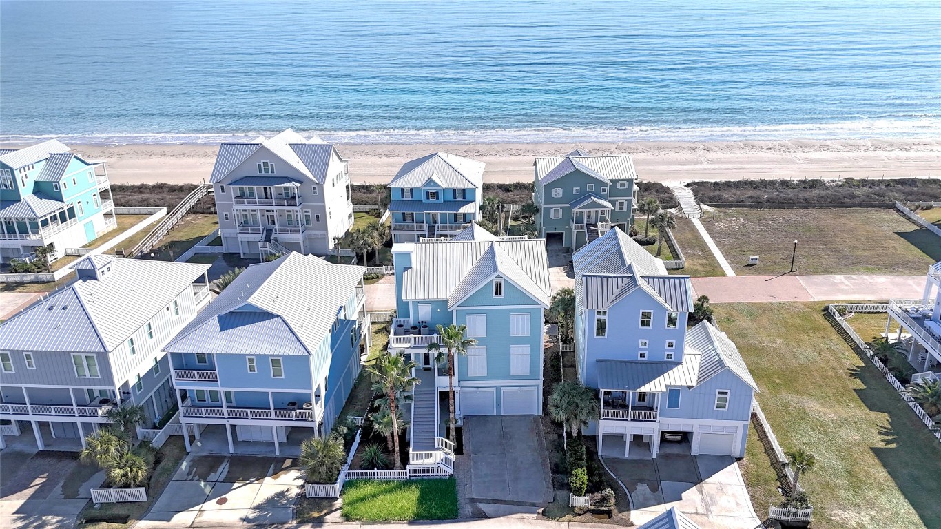 11610 Beachside Galveston, TX 77554 - Photo 2 of 50 Nestled on the second row from the beach, this home is just steps from the crossover providing quick and easy beach access.