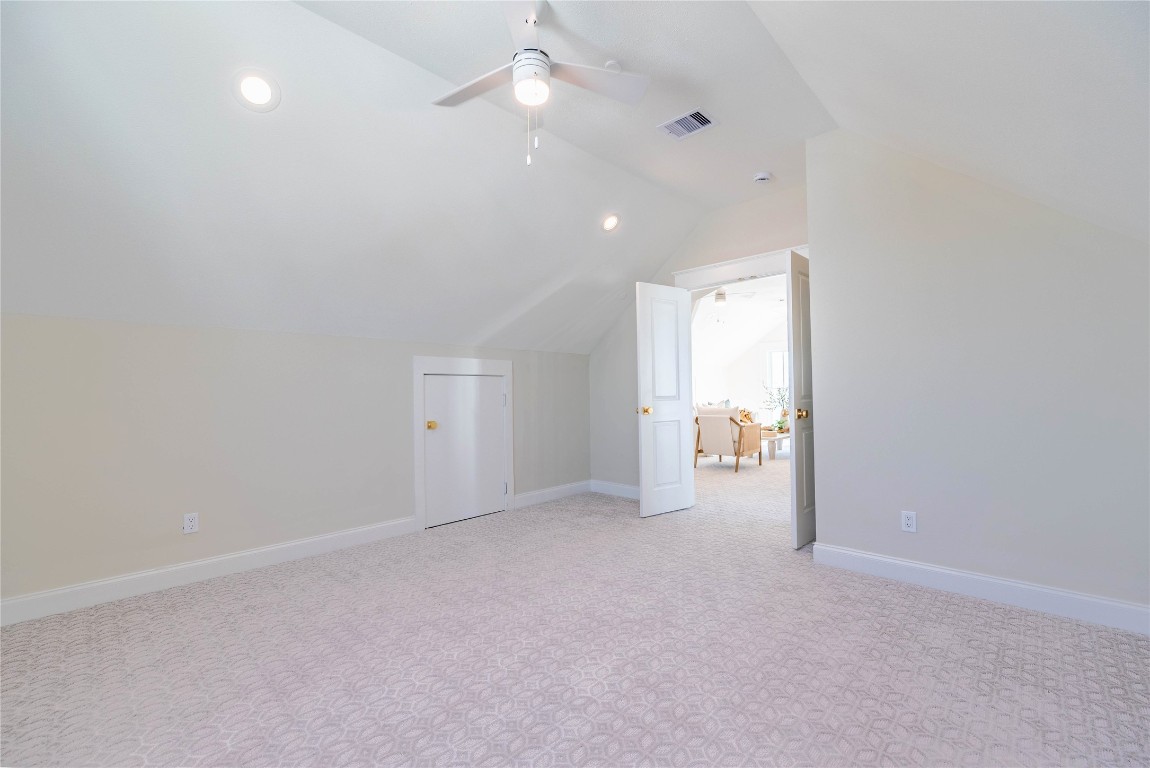 11610 Beachside Galveston, TX 77554 - Photo 45 of 50 an empty room with staircase and white walls