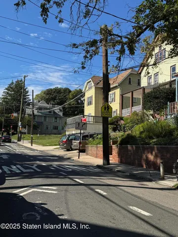 a view of a building with a street