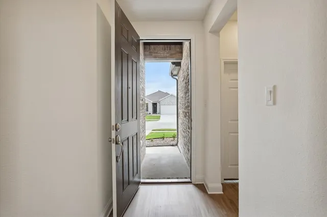 a view of livingroom with wooden floor