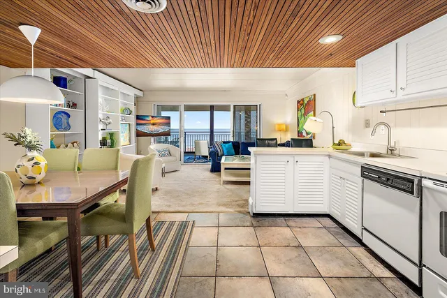 a bedroom with a bed and a chair