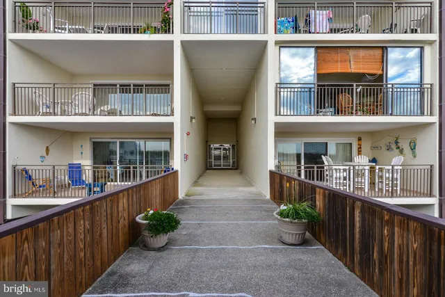 a view of a livingroom with furniture and wooden floor