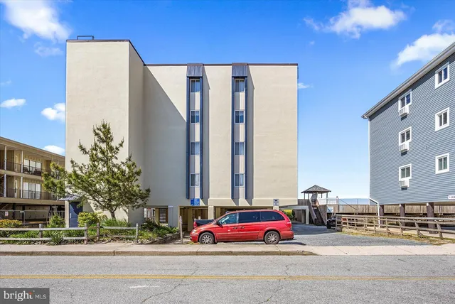 a view of a swimming pool with an outdoor seating
