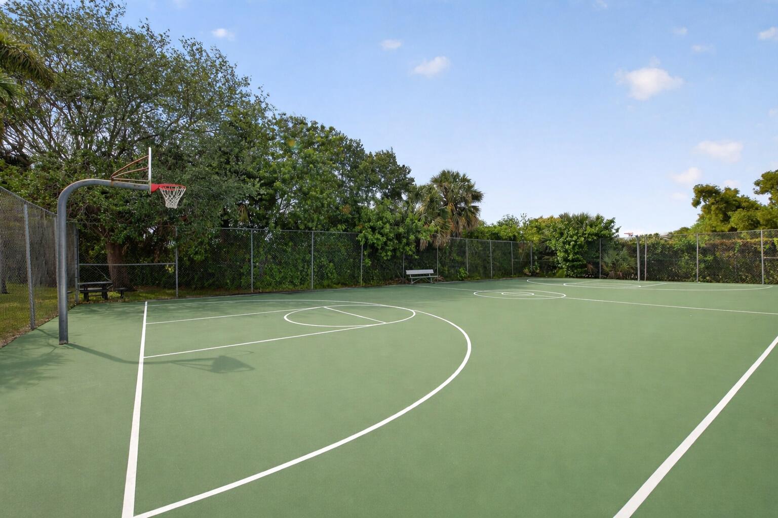 423 Pine Tree Court, Unit 23 Atlantis, FL 33462 - Photo 30 of 33 a view of a tennis court